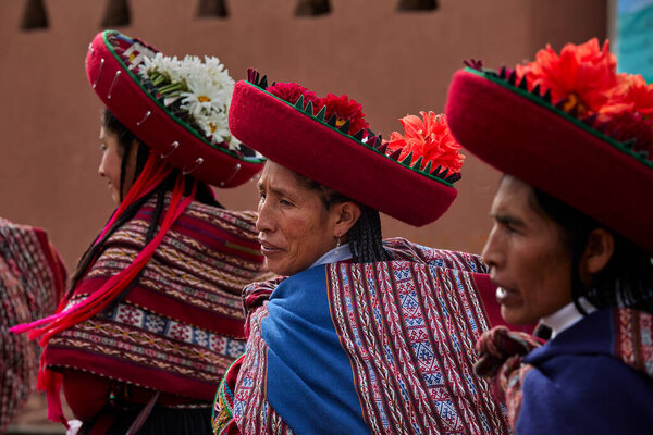  Dressed in their beautifully woven garments, the people of Chinchero come together in a joyful celebration of culture, heritage, and community.