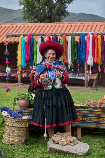  Dressed in their beautifully woven garments, the people of Chinchero come together in a joyful celebration of culture, heritage, and community.