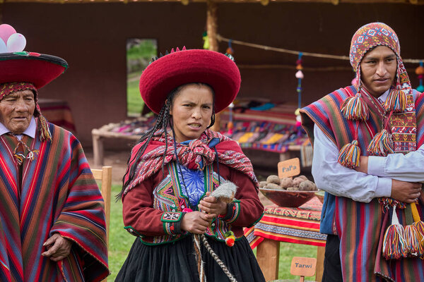  Dressed in their beautifully woven garments, the people of Chinchero come together in a joyful celebration of culture, heritage, and community.
