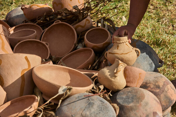 the firing process of clay pottery in Huancas brings earth to life. Each vessel, shaped by ancestral hands, hardens in the heat, transforming into a timeless symbol of tradition, resilience, and cultural heritage in Chachapoyas.