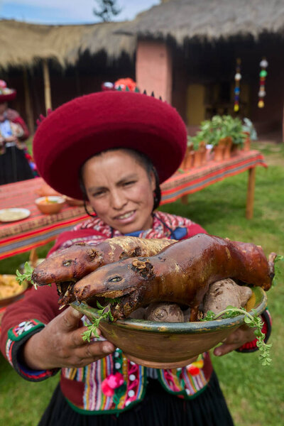 Dressed in their beautifully woven garments, the people of Chinchero come together in a joyful celebration of culture, heritage, and community.