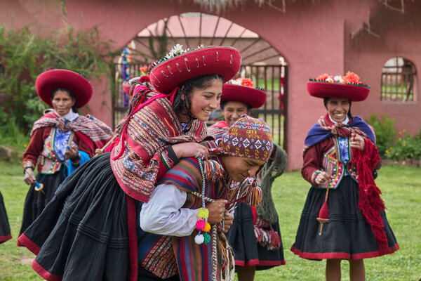 Dressed in their beautifully woven garments, the people of Chinchero come together in a joyful celebration of culture, heritage, and community.