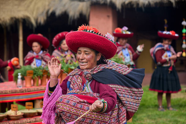 Dressed in their beautifully woven garments, the people of Chinchero come together in a joyful celebration of culture, heritage, and community.