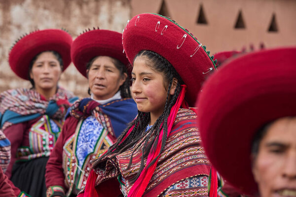Dressed in their beautifully woven garments, the people of Chinchero come together in a joyful celebration of culture, heritage, and community.