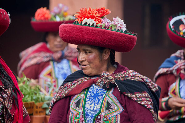Dressed in their beautifully woven garments, the people of Chinchero come together in a joyful celebration of culture, heritage, and community.