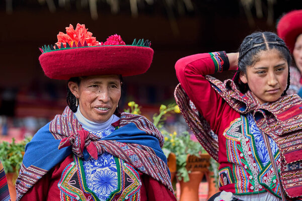 Dressed in their beautifully woven garments, the people of Chinchero come together in a joyful celebration of culture, heritage, and community.