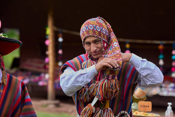 Dressed in their beautifully woven garments, the people of Chinchero come together in a joyful celebration of culture, heritage, and community.