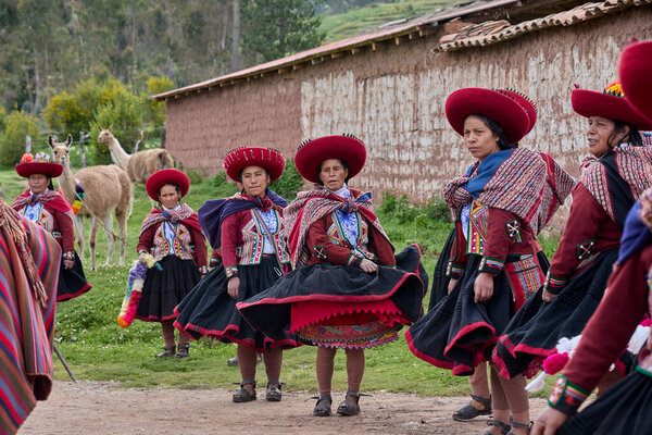 Dressed in their beautifully woven garments, the people of Chinchero come together in a joyful celebration of culture, heritage, and community.