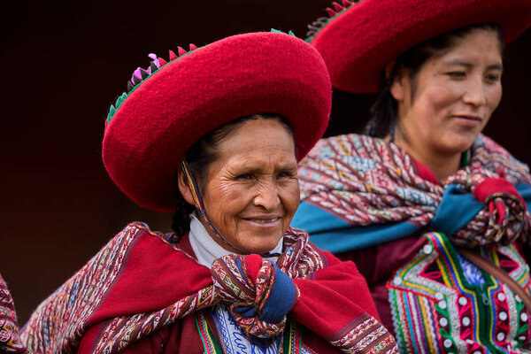 Dressed in their beautifully woven garments, the people of Chinchero come together in a joyful celebration of culture, heritage, and community.