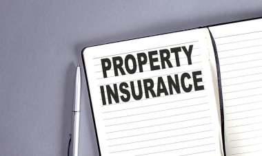 Not defterine kalemle yazılmış Mülkiyet Sözcüğü