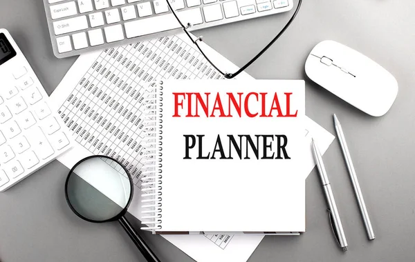 Financial Planner Text Notepad Chart Keyboard Calculator Grey Background — Stock Photo, Image