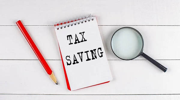 Ahorro Impuestos Texto Cuaderno Sobre Fondo Madera Blanca Concepto Negocio —  Fotos de Stock