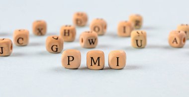 PMI written on wooden cube , business concept