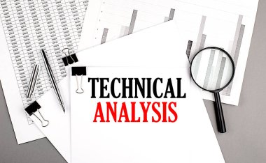 TECHNICAL ANALYSIS text on a paper on chart background