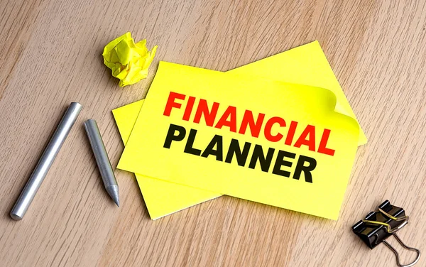 Financial Planner Written Sticky Notebooks —  Fotos de Stock