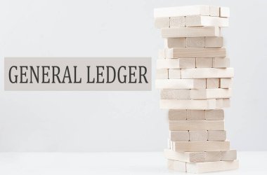 GENERAL LEDGER text with wooden block stack on white background , business