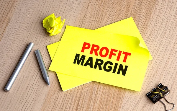 Profit Margin Written Sticky Notebooks —  Fotos de Stock