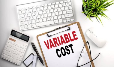 VARIABLE COST text on a white paper. the inscription on the notebook