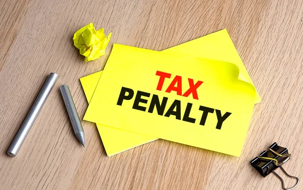 Tax Penalty Written Sticky Notebooks —  Fotos de Stock