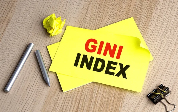 Gini Index Escrito Pegajoso Cuadernos —  Fotos de Stock