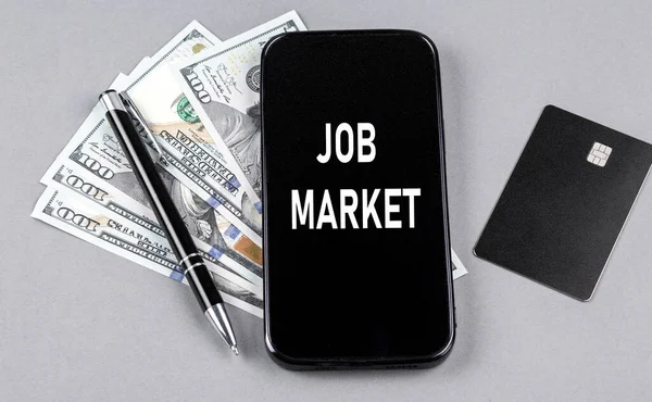 Creditcard Tekst Job Market Een Smartphone Met Dollars Pen Bedrijfsconcept — Stockfoto