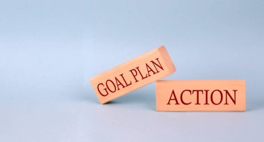 Hedef Plan Eylem metni ahşap blok, mavi arkaplan