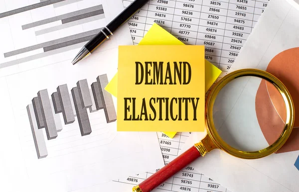 Demand Elasticity Text Sticky Graph Background Pen Magnifier — Stock Photo, Image