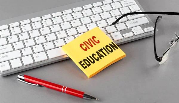 Civic Education Text Sticky Keyboard Pen Glasses Grey Background — Stock Photo, Image