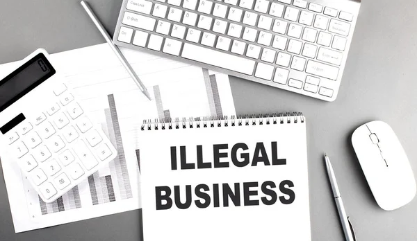 Illegal Business Tekst Napisany Notatniku Szarym Tle Wykresem Klawiaturą Koncepcja — Zdjęcie stockowe