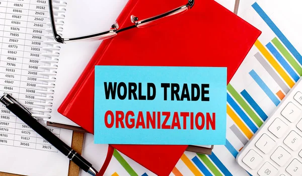 Organizzazione Mondiale Del Commercio Testo Blocco Appiccicoso Notebook Rosso Sfondo — Foto Stock
