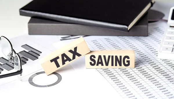 Tax Saving Text Dřevěném Bloku Grafem Notebookem — Stock fotografie