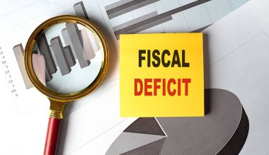 FISCAL DEFICIT metin üzerinde bir yapışkan tablo, iş