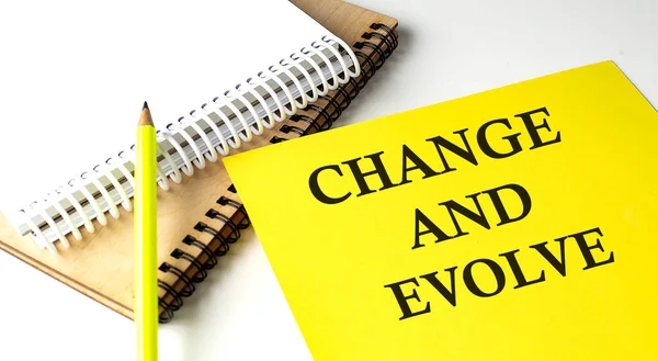 Change Evolve Text Written Yellow Paper Notebook — Stock Photo, Image