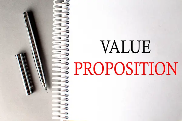Value Proposition Text Notebook Pen Grey Background — Stock Photo, Image