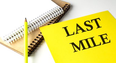 Not defteriyle sarı kağıda yazılmış son MILE metni