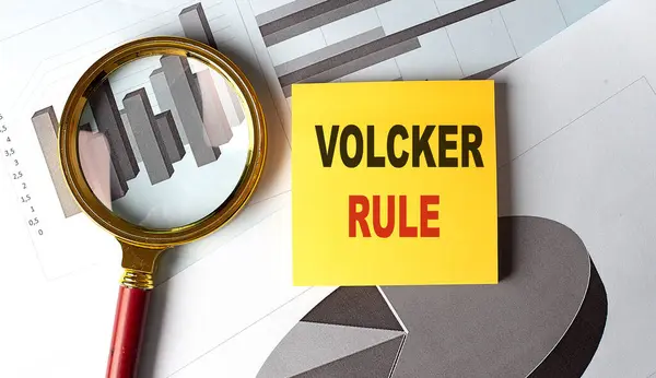 stock image VOLCKER RULE text on a sticky on chart, business