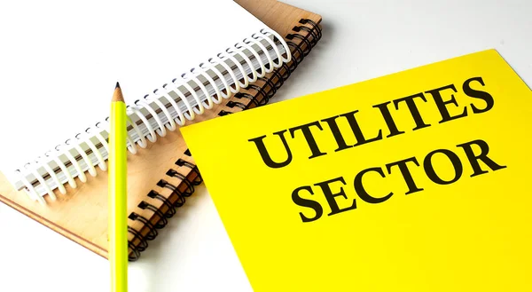 Текст Sector Utilities Написаний Жовтому Папері Блокнотом Стокове Фото