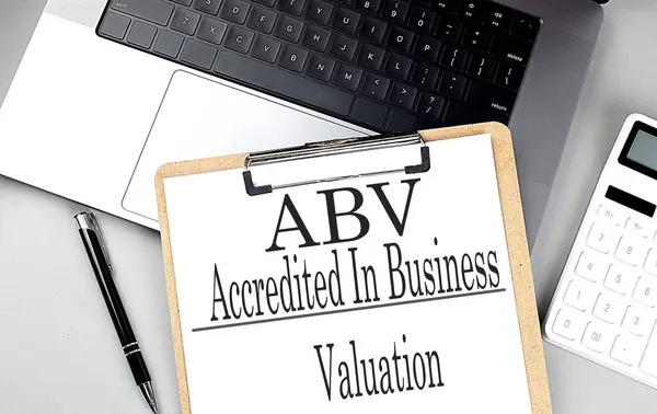 Abv Accredited Business Valuation Word Clipboard Laptop Calculator Pen — Stock Photo, Image