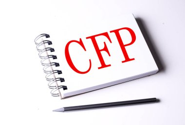 CFP word on a notebook on white background  clipart