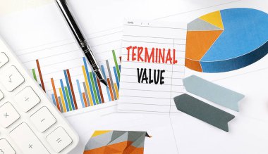 Çerçeve arkaplanındaki bir not kağıdındaki TERMINAL VALUE metni . 