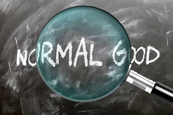 stock image Normal Good - learn, study and inspect it. Taking a closer look at normal good. A magnifying glass enlarging word 'normal good' written on a blackboard