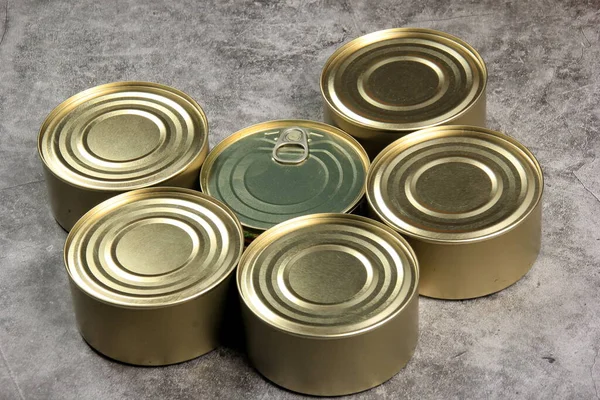 Many Closed Tin Cans White Gray Background Metal Cans Fish — Stock Photo, Image