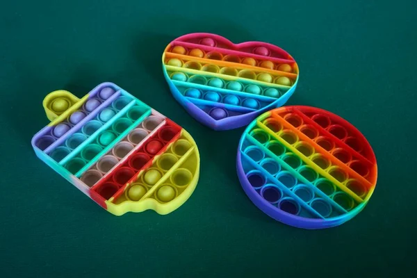 colorful antistress toys. Fidget toy set. Pop It sensory vector toy. Rainbow square popular pop it