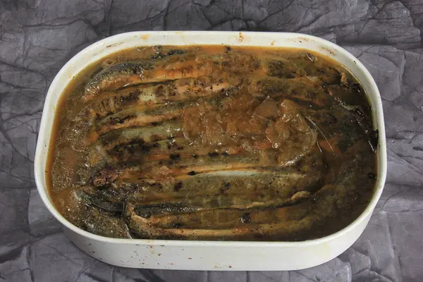 stock image Fried whole lampreys on a plate, Fish delicacies, Latvian cuisine