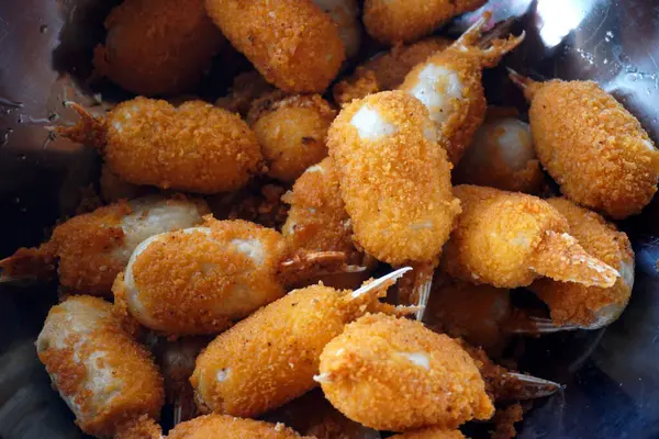 stock image  Deep-fried surimi. Fried crab claws. Surimi Crab Claw and battered fish snacks                              