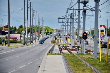 Toronto, Ontario, Canada, June 28, 2024: A Eglinton Crosstown LRT test train makes it's way along the transit line in Scarborough. There is no opening date yet for the line as of Sept. 2024. clipart