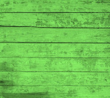 Eski yeşil tahtaları olan kirli ahşap duvar.