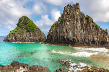 Fernando de Noronha, Brasil. Turquoise water around the Two Brothers rocks, UNESCO World Heritage Site, Brazil, South America. South America. clipart