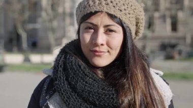 Hispanic Latin American Young Woman smiling in the city. Female girl from Andean Ethnicity - Bolivia