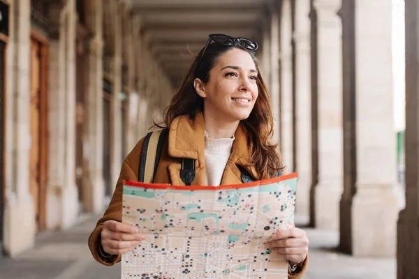 Young Joyful Woman Checking City Map Winter Vacations Visiting Historical — kuvapankkivalokuva